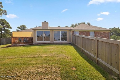 This beautifully maintained 4-bedroom, 2-bath gem nestled in the on Annandale Golf Club in Mississippi - for sale on GolfHomes.com, golf home, golf lot