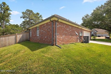 This beautifully maintained 4-bedroom, 2-bath gem nestled in the on Annandale Golf Club in Mississippi - for sale on GolfHomes.com, golf home, golf lot