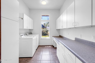 'A dream come true - custom-built home on 1/2 acre double lot (a on Diamondhead Country Club in Mississippi - for sale on GolfHomes.com, golf home, golf lot