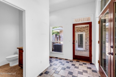 'A dream come true - custom-built home on 1/2 acre double lot (a on Diamondhead Country Club in Mississippi - for sale on GolfHomes.com, golf home, golf lot