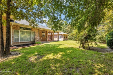 'A dream come true - custom-built home on 1/2 acre double lot (a on Diamondhead Country Club in Mississippi - for sale on GolfHomes.com, golf home, golf lot