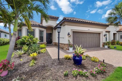 Welcome to 4540 Terrazza Court, where French Country elegance on Esplanade Golf and Country at Lakewood Ranch in Florida - for sale on GolfHomes.com, golf home, golf lot