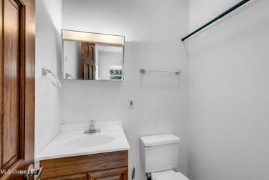 'A dream come true - custom-built home on 1/2 acre double lot (a on Diamondhead Country Club in Mississippi - for sale on GolfHomes.com, golf home, golf lot