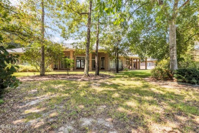 'A dream come true - custom-built home on 1/2 acre double lot (a on Diamondhead Country Club in Mississippi - for sale on GolfHomes.com, golf home, golf lot