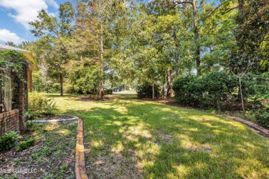 'A dream come true - custom-built home on 1/2 acre double lot (a on Diamondhead Country Club in Mississippi - for sale on GolfHomes.com, golf home, golf lot