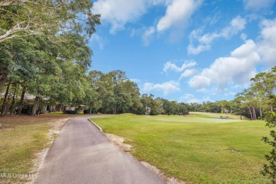 'A dream come true - custom-built home on 1/2 acre double lot (a on Diamondhead Country Club in Mississippi - for sale on GolfHomes.com, golf home, golf lot