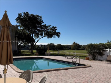 Ground-floor 2/2 in Pine Island Ridge Country Club with gorgeous on Pine Island Ridge Country Club in Florida - for sale on GolfHomes.com, golf home, golf lot