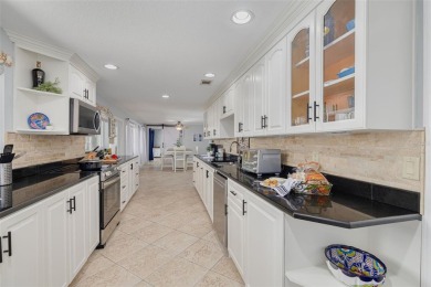 Welcome to your tropical paradise located in the sought after on Gulf Harbors Golf Course in Florida - for sale on GolfHomes.com, golf home, golf lot