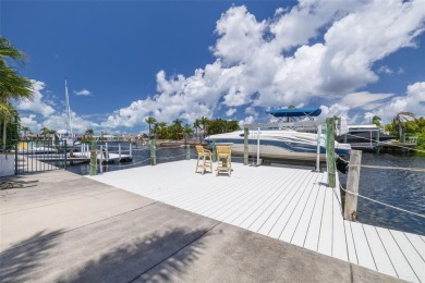 Welcome to your tropical paradise located in the sought after on Gulf Harbors Golf Course in Florida - for sale on GolfHomes.com, golf home, golf lot