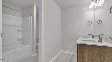 Welcome to 7597 Percussion Drive at Horton Park, located in Apex on Knights Play Golf Center in North Carolina - for sale on GolfHomes.com, golf home, golf lot