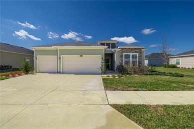 Enjoy all that this beautiful 2023 4-bedroom, 2-bathroom, 3-car on Candler Hills Golf and Country Club in Florida - for sale on GolfHomes.com, golf home, golf lot