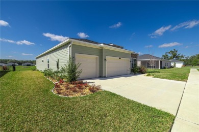 Enjoy all that this beautiful 2023 4-bedroom, 2-bathroom, 3-car on Candler Hills Golf and Country Club in Florida - for sale on GolfHomes.com, golf home, golf lot