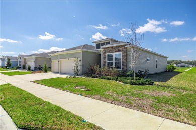 Enjoy all that this beautiful 2023 4-bedroom, 2-bathroom, 3-car on Candler Hills Golf and Country Club in Florida - for sale on GolfHomes.com, golf home, golf lot