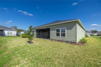 Enjoy all that this beautiful 2023 4-bedroom, 2-bathroom, 3-car on Candler Hills Golf and Country Club in Florida - for sale on GolfHomes.com, golf home, golf lot