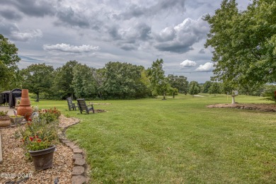Immaculate Home with Golf Course Views in Loma Linda! This on The Bald Eagle Course At Eagle Creek Golf Club in Missouri - for sale on GolfHomes.com, golf home, golf lot