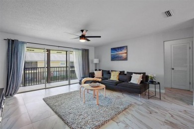 Welcome to 200 Country Club Dr #1004, Largo, FL 33771! This on East Bay Golf Club in Florida - for sale on GolfHomes.com, golf home, golf lot