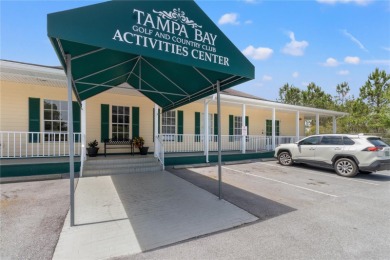 WELCOME TO FLORIDA living at its best!  This beautifully on Tampa Bay Golf and Country Club in Florida - for sale on GolfHomes.com, golf home, golf lot