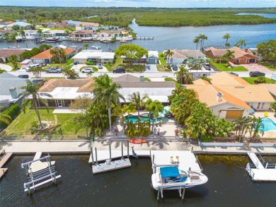 Welcome to your tropical paradise located in the sought after on Gulf Harbors Golf Course in Florida - for sale on GolfHomes.com, golf home, golf lot