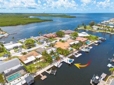 Welcome to your tropical paradise located in the sought after on Gulf Harbors Golf Course in Florida - for sale on GolfHomes.com, golf home, golf lot