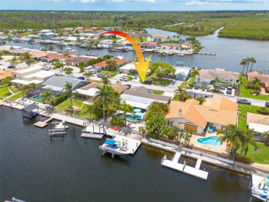 Welcome to your tropical paradise located in the sought after on Gulf Harbors Golf Course in Florida - for sale on GolfHomes.com, golf home, golf lot