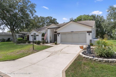 Welcome to this totally updated POOL HOME. SOLAR HEATED POOL on Timber Pines Golf Course in Florida - for sale on GolfHomes.com, golf home, golf lot