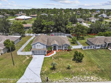 Step into refined Florida living with this beautifully upgraded on Spring Hill Golf Course in Florida - for sale on GolfHomes.com, golf home, golf lot
