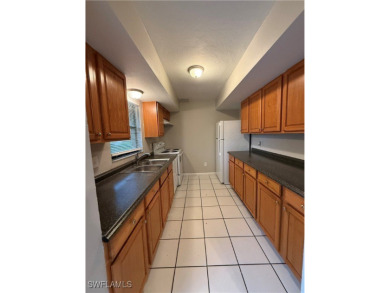 This duplex 2 bedrooms and 2 bathrooms each unit is ideally on San Carlos Golf Club in Florida - for sale on GolfHomes.com, golf home, golf lot