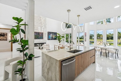 A striking, newly renovated two-story residence showcasing on  in Florida - for sale on GolfHomes.com, golf home, golf lot