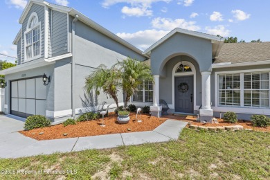Step into refined Florida living with this beautifully upgraded on Spring Hill Golf Course in Florida - for sale on GolfHomes.com, golf home, golf lot
