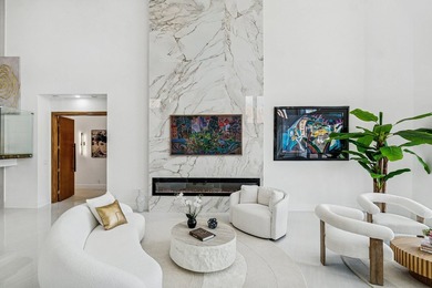 A striking, newly renovated two-story residence showcasing on  in Florida - for sale on GolfHomes.com, golf home, golf lot