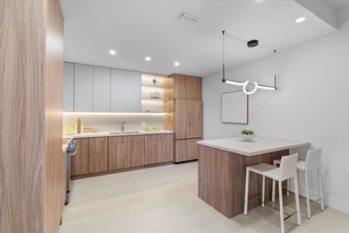 This light-filled first-floor condo has been completely on Polo Club of Boca Raton in Florida - for sale on GolfHomes.com, golf home, golf lot