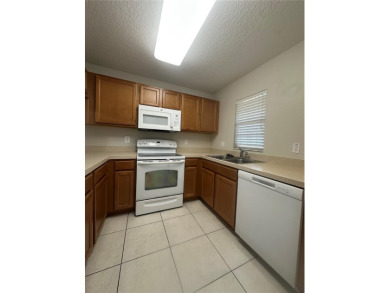 Step into this beautifully maintained 2-bedroom, 2.5-bath on Sandpiper Golf Club in Florida - for sale on GolfHomes.com, golf home, golf lot
