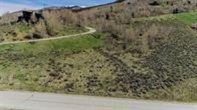 Stunning views on a rare vacant lot in Hamilton Creek to build on  in Colorado - for sale on GolfHomes.com, golf home, golf lot