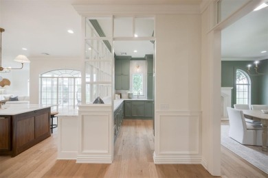 Welcome to this stunning single-story residence where modern on Oak Tree National Golf and Country Club in Oklahoma - for sale on GolfHomes.com, golf home, golf lot