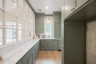 Welcome to this stunning single-story residence where modern on Oak Tree National Golf and Country Club in Oklahoma - for sale on GolfHomes.com, golf home, golf lot