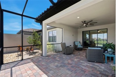 This IMMACULATE KENDRICK VILLA offers peaceful WATER VIEWS from on Panther Run Golf Club in Florida - for sale on GolfHomes.com, golf home, golf lot