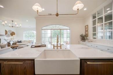 Welcome to this stunning single-story residence where modern on Oak Tree National Golf and Country Club in Oklahoma - for sale on GolfHomes.com, golf home, golf lot