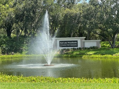LOCATION, LOCATION, LOCATION!  Close to entertainment, shopping on East Lake Woodlands Country Club in Florida - for sale on GolfHomes.com, golf home, golf lot