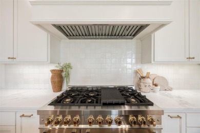 Welcome to this stunning single-story residence where modern on Oak Tree National Golf and Country Club in Oklahoma - for sale on GolfHomes.com, golf home, golf lot