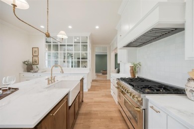 Welcome to this stunning single-story residence where modern on Oak Tree National Golf and Country Club in Oklahoma - for sale on GolfHomes.com, golf home, golf lot