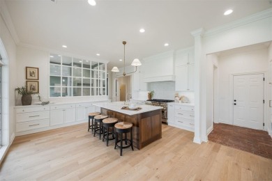 Welcome to this stunning single-story residence where modern on Oak Tree National Golf and Country Club in Oklahoma - for sale on GolfHomes.com, golf home, golf lot
