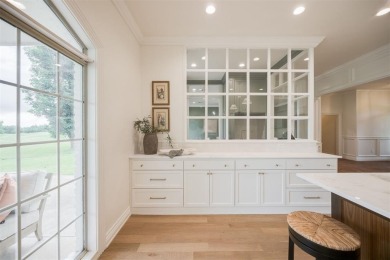 Welcome to this stunning single-story residence where modern on Oak Tree National Golf and Country Club in Oklahoma - for sale on GolfHomes.com, golf home, golf lot