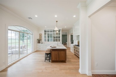 Welcome to this stunning single-story residence where modern on Oak Tree National Golf and Country Club in Oklahoma - for sale on GolfHomes.com, golf home, golf lot