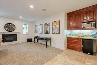 Among the rare custom Westridge Estates perched along the 18th on TPC At Valencia in California - for sale on GolfHomes.com, golf home, golf lot