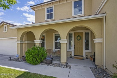 The spacious primary suite includes a private balcony where you on DAndrea Golf Club in Nevada - for sale on GolfHomes.com, golf home, golf lot