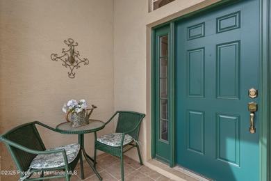 This end-unit Sea Breeze Villa nestled within Pine Meadow on Heritage Pines Country Club in Florida - for sale on GolfHomes.com, golf home, golf lot