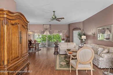 This end-unit Sea Breeze Villa nestled within Pine Meadow on Heritage Pines Country Club in Florida - for sale on GolfHomes.com, golf home, golf lot