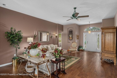 This end-unit Sea Breeze Villa nestled within Pine Meadow on Heritage Pines Country Club in Florida - for sale on GolfHomes.com, golf home, golf lot