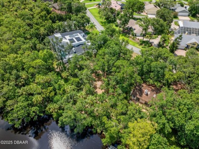 Tucked inside one of Florida's most distinctive GATED on Spruce Creek Golf Club in Florida - for sale on GolfHomes.com, golf home, golf lot