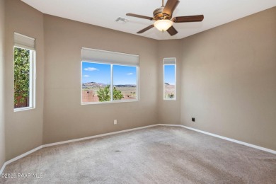 Views, views, views!! This home is nestled between the Quailwood on Quail Wood Greens Golf Course in Arizona - for sale on GolfHomes.com, golf home, golf lot